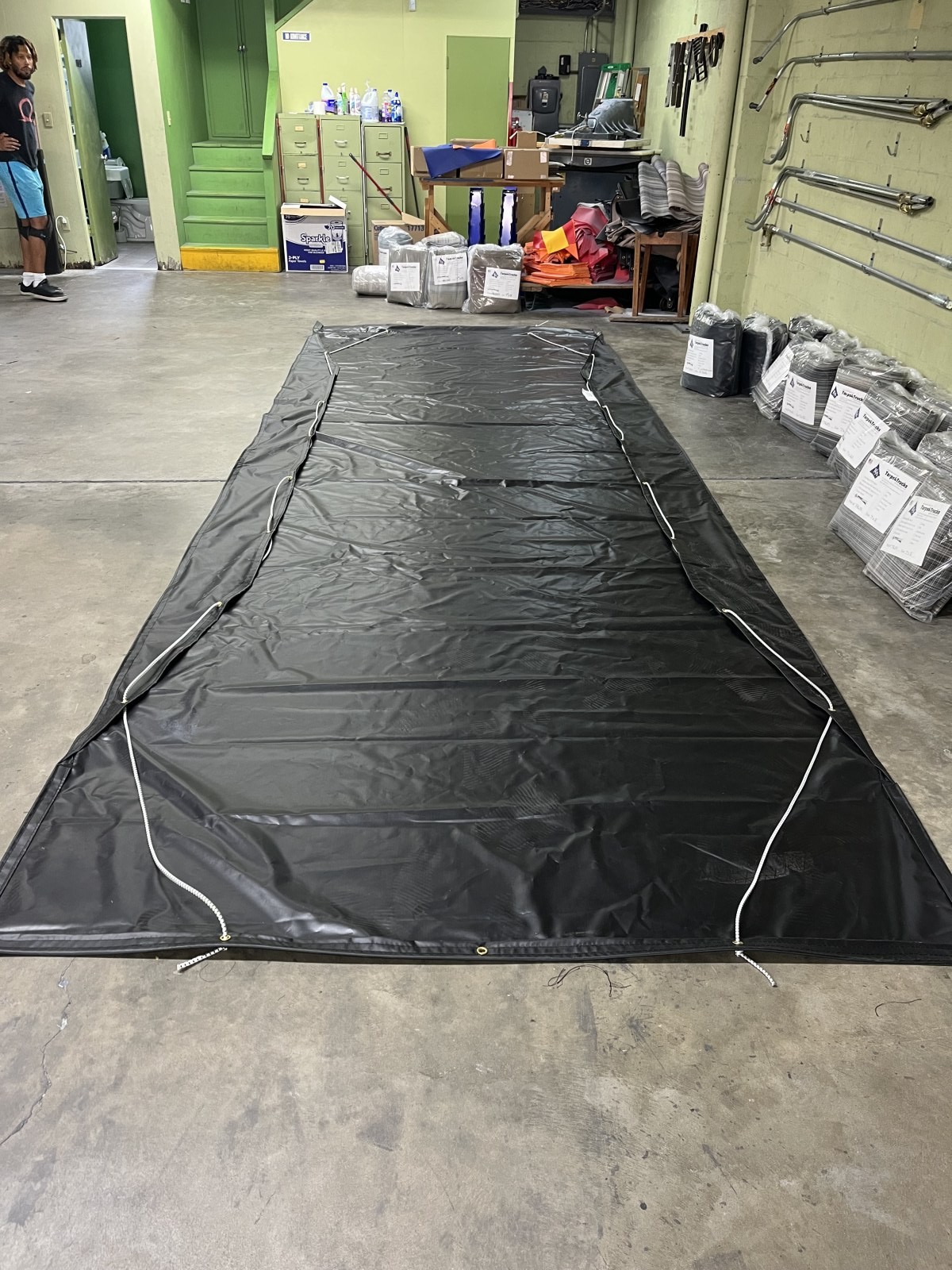 Vinyl Flap Tarp w/Flaps and shockcord. Never walk in the load again. Our design has the tarp fold up on top of your tarp as soon as you let them go!